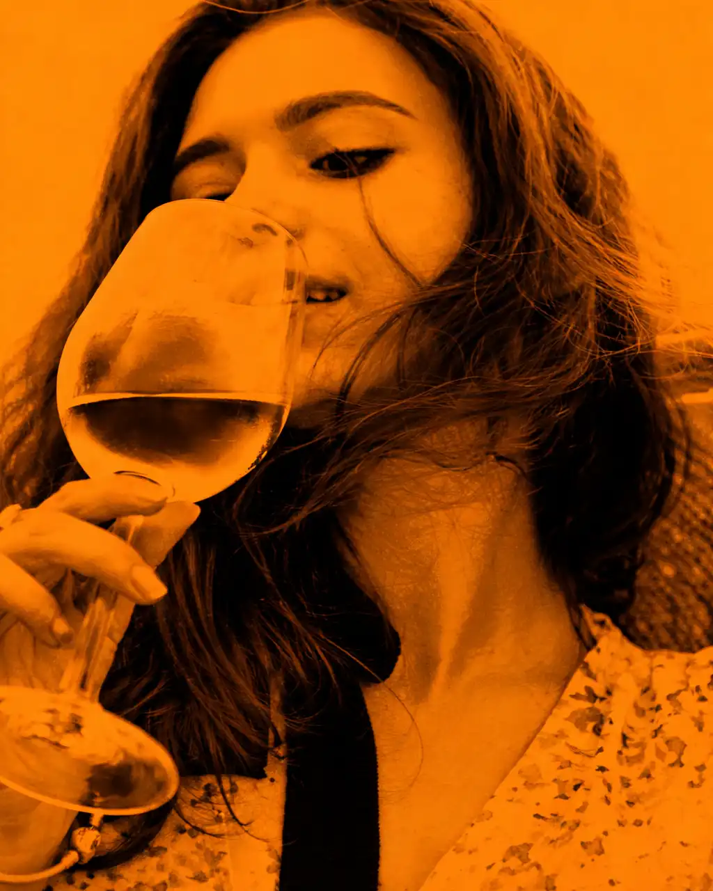 Guest enjoying a glass of wine during Gusto Festival