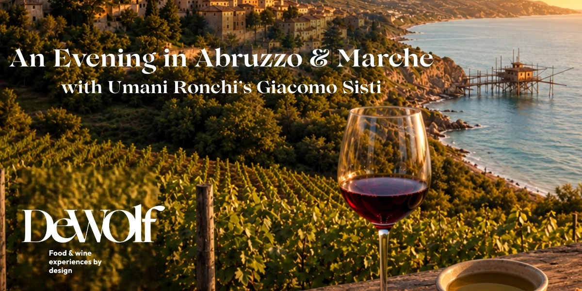 An Evening in Abruzzo & Marche with Umani Ronchi’s Giacomo Sisti: coastal vineyards at sunset and a glass of red wine.