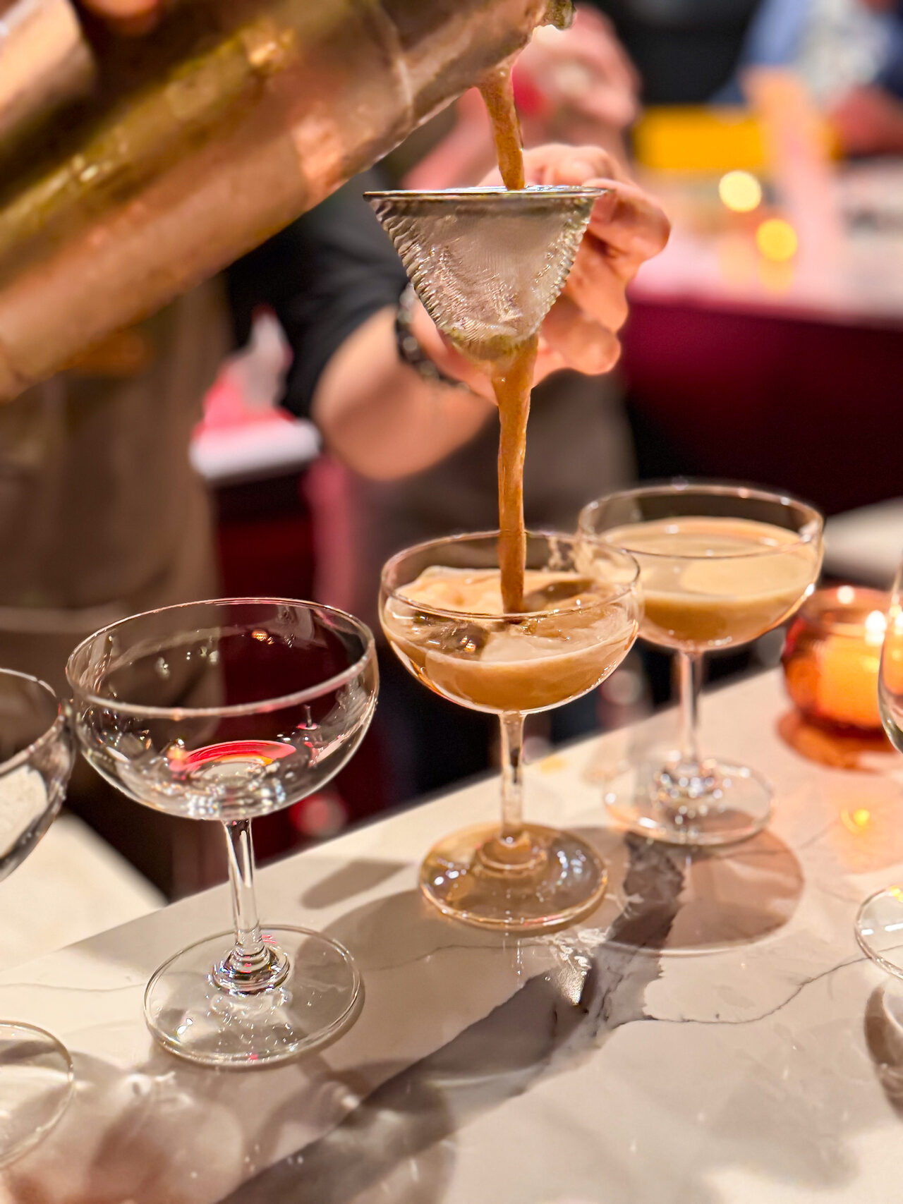 Cocktails being finished at a previous First Pour event